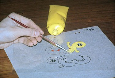 Painting with acrylic paint on the reverse side of an already inked cel.