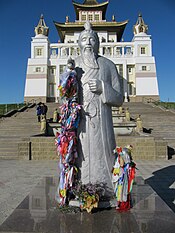 Statue of the White Elder in front of the monastery building