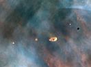 A protoplanetary disk forming in the Orion Nebula