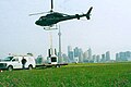 Helicopter beginning Canadian Arrow's crew cabin drop test on the Toronto Islands, August 14, 2004.