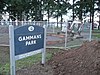 The sign for Gammans Park, with a new carousel under construction in the background