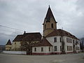 Evangelische Kirche, Glockenturm und Schule in Târnava