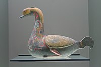 An earthenware goose pourer with lacquerware paint designs, Western Han dynasty, late 3rd century BC to early 1st century AD