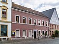 Wohnhaus in geschlossener Bebauung, ehemaliges Gasthaus „Restaurant Zur Post“