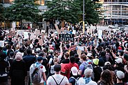 Protesters in Minneapolis where George Floyd was murdered and the unrest began on 26 May 2020.