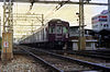 A Hankyu Railway 5200 Series train at the diamond crossings at Nishinomiya-Kitaguchi Station in 1980