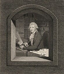 Seated engraved portrait at a library of John Thane, examining a print, a pile of manuscripts with seals to his left