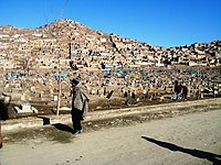 Hillside housing and a cemetery in Kabul, Afghanistan