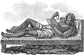 A fakir lying on a bed of nails.