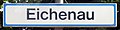 Haltepunkt Eichenau, Schild im Design der 1980er/90er Jahre mit verkehrsblauem Rand
