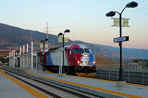 A FrontRunner train approaching the Farmington station.