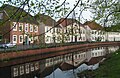 Huizen langs een zijtak van de Hunte bij het centrum van Oldenburg