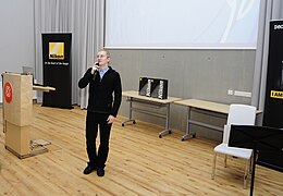 Saying the opening words in Estonian Science Photo 2012 awarding ceremony
