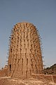 Minaret with protruding horizontal wooden sticks of the mosque of Bani, Burkina Faso, 2007