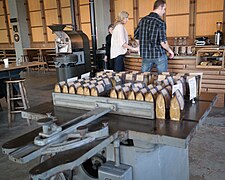 A table saw at Coava Coffee