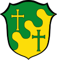 Gemeinde Scheuring Im Wolkenschnitt schräglinks geteilt von Grün und Gold; oben und unten je ein Kreuz in verwechselter Farbe.