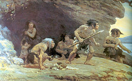 A group of 4 Neanderthal men, 1 woman, and her naked son standing on a rock platform with a cave behind them, looking worriedly off to the right. The men are wearing only furs wrapped around their waist, one has a spear, and another is crouching with food in his hand. The woman is standing inside the cave, has a fur pulled up to her collarbone, and is holding her son close