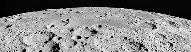 Oblique view of Mare Australe on the moon, facing south, from Apollo 15. The crater Abel is at right, Gernsback is at left, with Donner in the left foreground. The craters Lamb, Jenner, and Gum are visible on the horizon (from left to right).