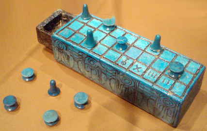 Gamepiece "tokens" (common) and a Senet gameboard[3]