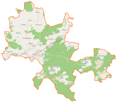 Mapa konturowa gminy Sianów, blisko centrum na lewo u góry znajduje się punkt z opisem „Arboretum Karnieszewice”