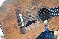 Willie Nelson's guitar, Trigger, has been signed by several of Nelson's friends