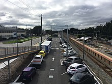car park viewed from a footbridge