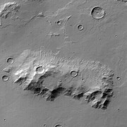 Ausonia Mensa, as seen by MGS, under the MOC Public Targeting Program. This eroded mensa has many channels.