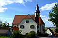 Kirche "St. Remigius" (1748) mit Pfarrhaus