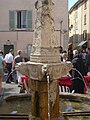 Barrel fountain in Basse-sur-Issole (1542). The iron rods over the fountain were designed to support jars and jugs as they were filled with water pouring from canons above.