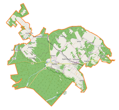 Mapa konturowa gminy Józefów, blisko centrum na prawo znajduje się punkt z opisem „Siedliska”