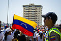 Protesto gösterileri sırasında Venezuela bayrağı