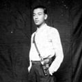 Trader wearing a Mauser pistol, Lhasa, 1946.