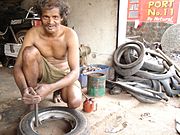 Two-wheeler puncture repairer in Saligao.