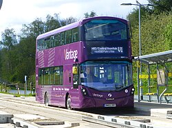 Route V1 in the original Vantage branding, at Newearth Road bus stop on the guided busway section.