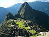 View of Huayna Picchu towering above the ruins of Machu Picchu