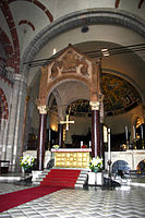 Ciborium of Sant'Ambrogio, Milan; note the rods for curtains. The columns are probably 4th century, the canopy 9th, 10th or 12th century.