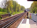 A train heads south from Ash Vale station towards Aldershot in April 2006.