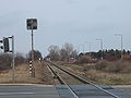 Eisenbahnkreuzung mit der Hausfeldstraße im Jahr 2009