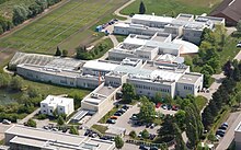 Aerial view of a large gray building