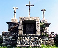 The Calvaire de Kerbreudeur. As can be seen the calvary is constructed in such a way as to create a niche in the centre and within this niche is a depiction of the resurrection and other scenes