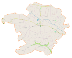 Mapa konturowa gminy Skalbmierz, blisko centrum na prawo znajduje się punkt z opisem „Sielec Biskupi”