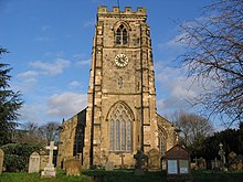 Close view of the stone tower of the church