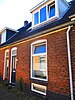 Onderdeel van een reeks van 9 woningen