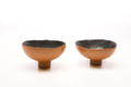 slip-burnished earthenware vessels, sealed with wax