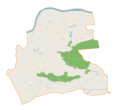 Mapa konturowa gminy Mędrzechów, blisko centrum na prawo u góry znajduje się punkt z opisem „Wójcina”