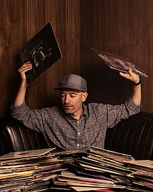 Peanut Butter Wolf at his vinyl bar Gold Line in Los Angeles, California, photo by Robb Klassen