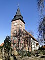 Kirche mit zwei eisernen Grabkreuzen Fritz und Wilhelmine Pankow und eisernes Grabkreuz (mit floralen Motiven)