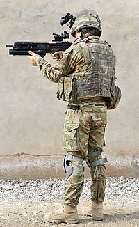 Rear view of a British Army soldier in full combat dress