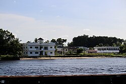 Houses along the Belait River in 2022