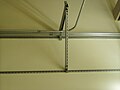 A shelf supporting electrical conduit and pipe, manufactured from strut channel